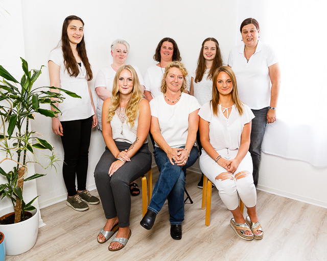 Gruppenfoto Team im Praxisraum